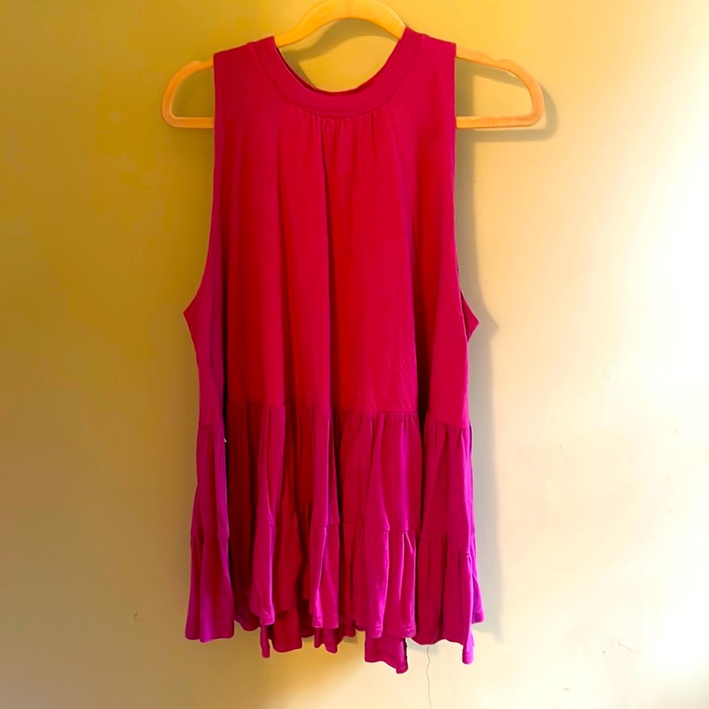 Free People magenta oversized, flowy tank top with open back. Size XS.